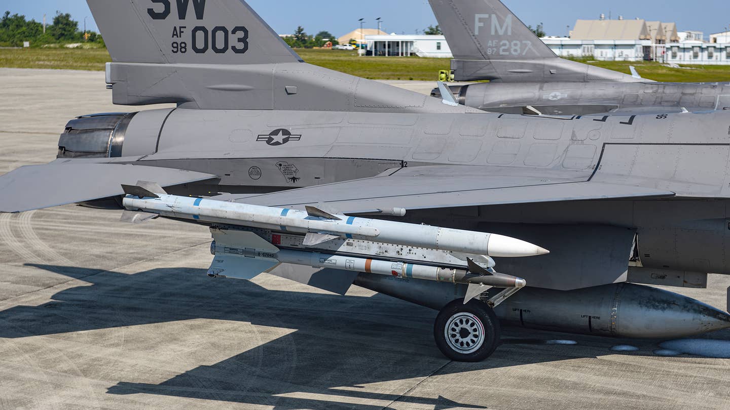 At the end-of-runway, with a live AIM-9M loaded. The blue band means no live warhead, but the brown band denotes a live rocket motor. <em>Jamie Hunter</em>