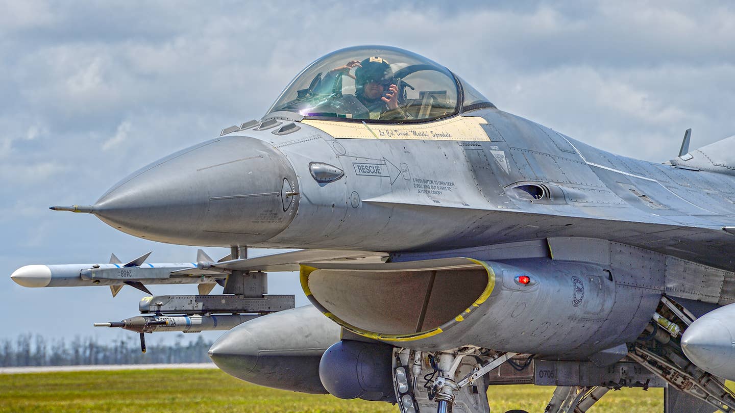 An F-16C pilot taxies out for the morning WSEP mission. <em>Jamie Hunter</em>
