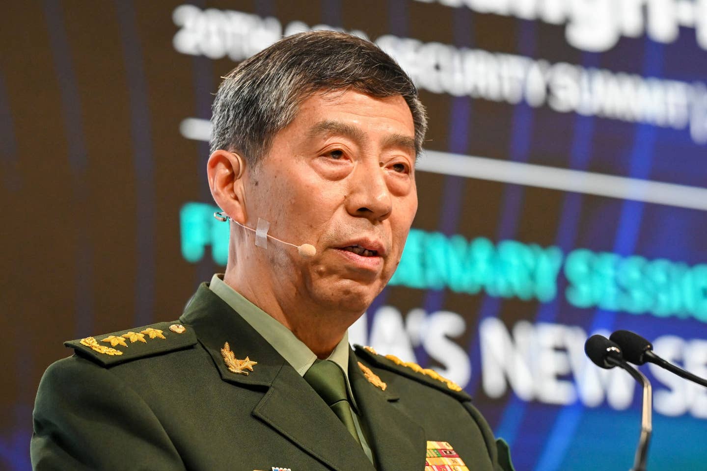 China’s Minister of National Defence Li Shangfu delivers a speech during the Shangri-La Dialogue summit in Singapore on June 4, 2023. <em>Photo by ROSLAN RAHMAN/AFP via Getty Images</em>