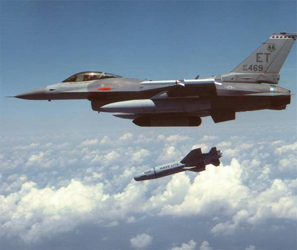A USAF test F-16 releasing a version of the Have Nap/Popeye missile. Note the datalink pod on its centerline pylon. (USAF)