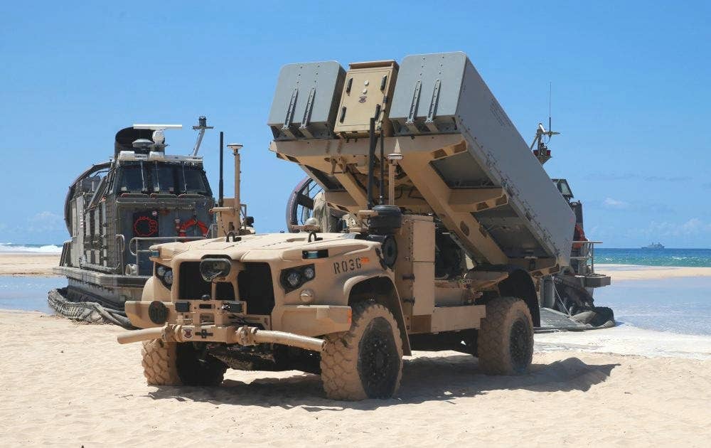 A Navy/Marine Corps Expeditionary Ship Interdiction System (NMESIS) prototype seen during an exercise in 2021. NMESIS is a ground-based launcher for the Naval Strike Missile that is mounted on an uncrewed vehicle derived from the 4x4 Joint Light Tactical Vehicle (JLTV). <em>USMC</em>
