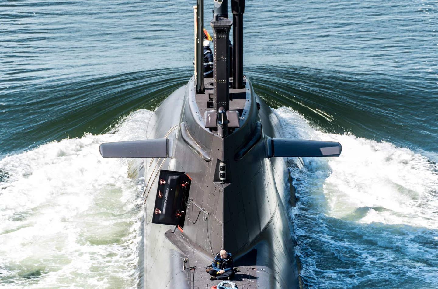 A rear view of the sail of a Type 212A class submarine while underway. <em>@ComDeuSubSqn</em>