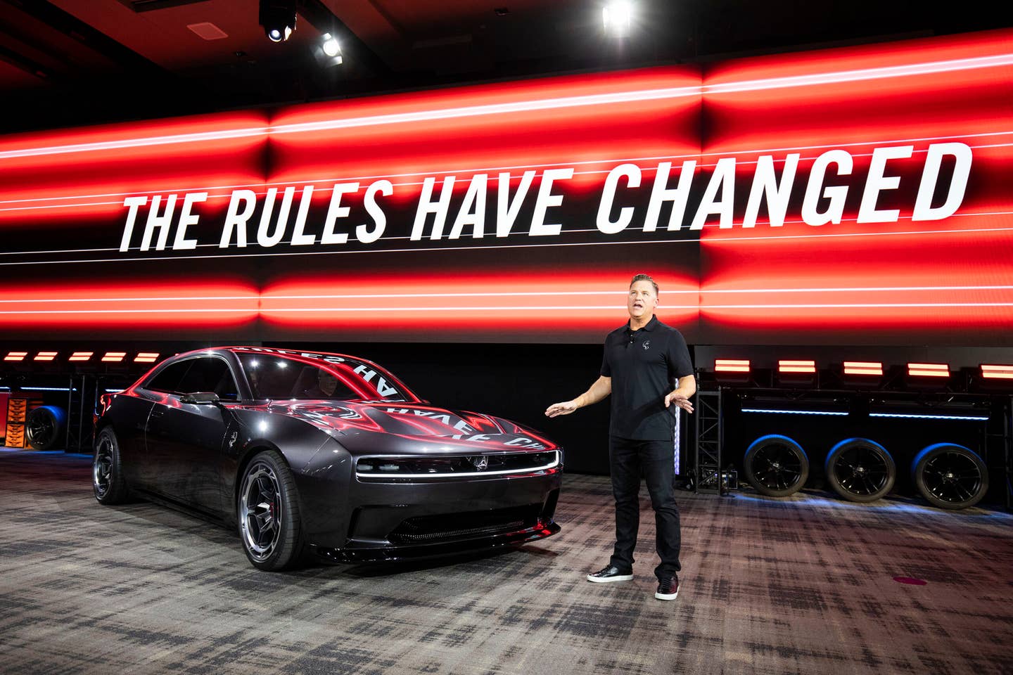 PONTIAC, MI - AUGUST 17: Tim Kuniskis, CEO of Dodge Brand, Stellantis, introduces the Dodge Charger Daytona SRT Concept all-electric muscle car at its world reveal during Dodge's Speed Week at M1 Concourse on August 17, 2022 in Pontiac, Michigan. A production electric vehicle from Dodge is expected to launch in 2024. (Photo by Bill Pugliano/Getty Images)