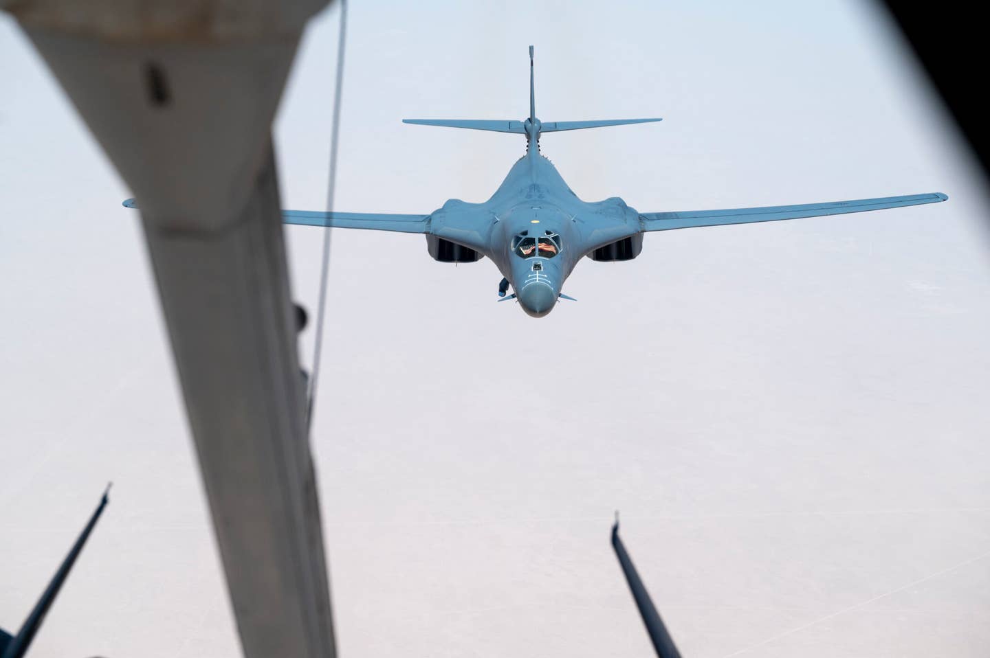 A U.S. Air Force B-1B Lancer approaches a U.S. Air Force KC-10A Extender for fuel during a Bomber Task Force mission above the Kingdom of Saudi Arabia, June 8, 2023. The BTF mission was designed to build agility and interoperability between the U.S. and coalition partners while demonstrating the rapid deployment of combat power to deter regional aggression while promoting regional stability in Southwest Asia. (U.S. Air Force photo by Staff Sgt. Frank Rohrig)