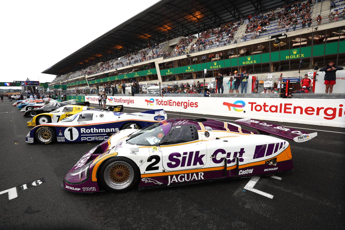 LE MANS, FRANCE - JUNE 09: The Silk Cut Jaguar takes part in a historic entrants parade ahead of the 100th anniversary of the 24 Hours of Le Mans race at the Circuit de la Sarthe June 9, 2023 in Le Mans, France. (Photo by Clive Rose/Getty Images)