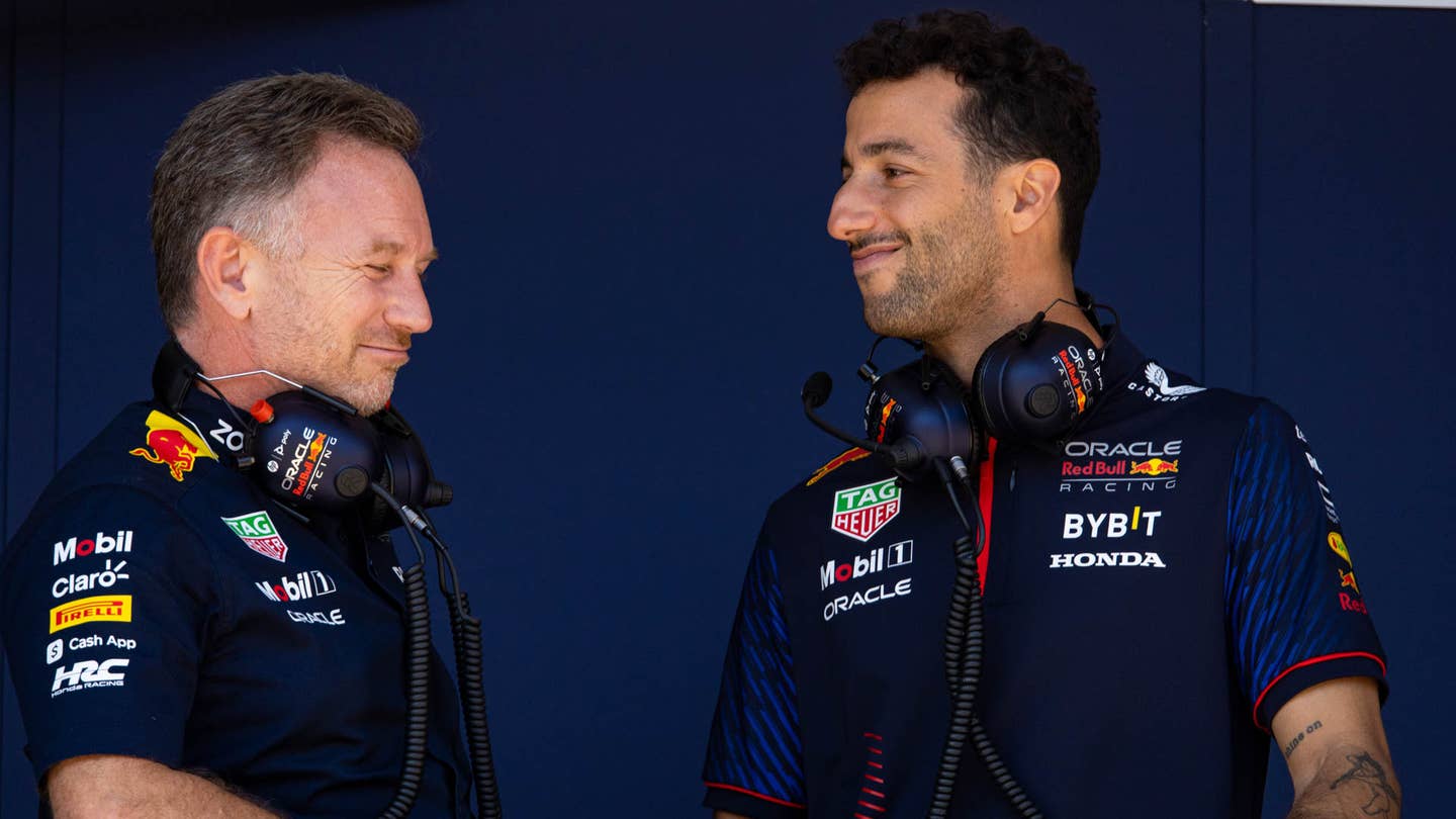 <em>Red Bull Team Principal Christian Horner (left), Daniel Ricciardo (right)| via Getty Images</em>