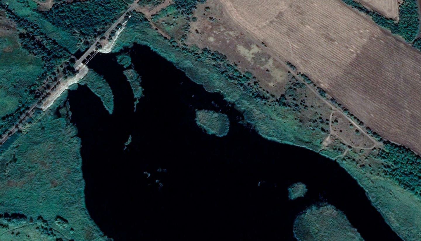 A satellite image of the dam and the Staromlynivske Reservoir on the Mokri Yaly River, dated January 2020. <em>Google Earth</em>
