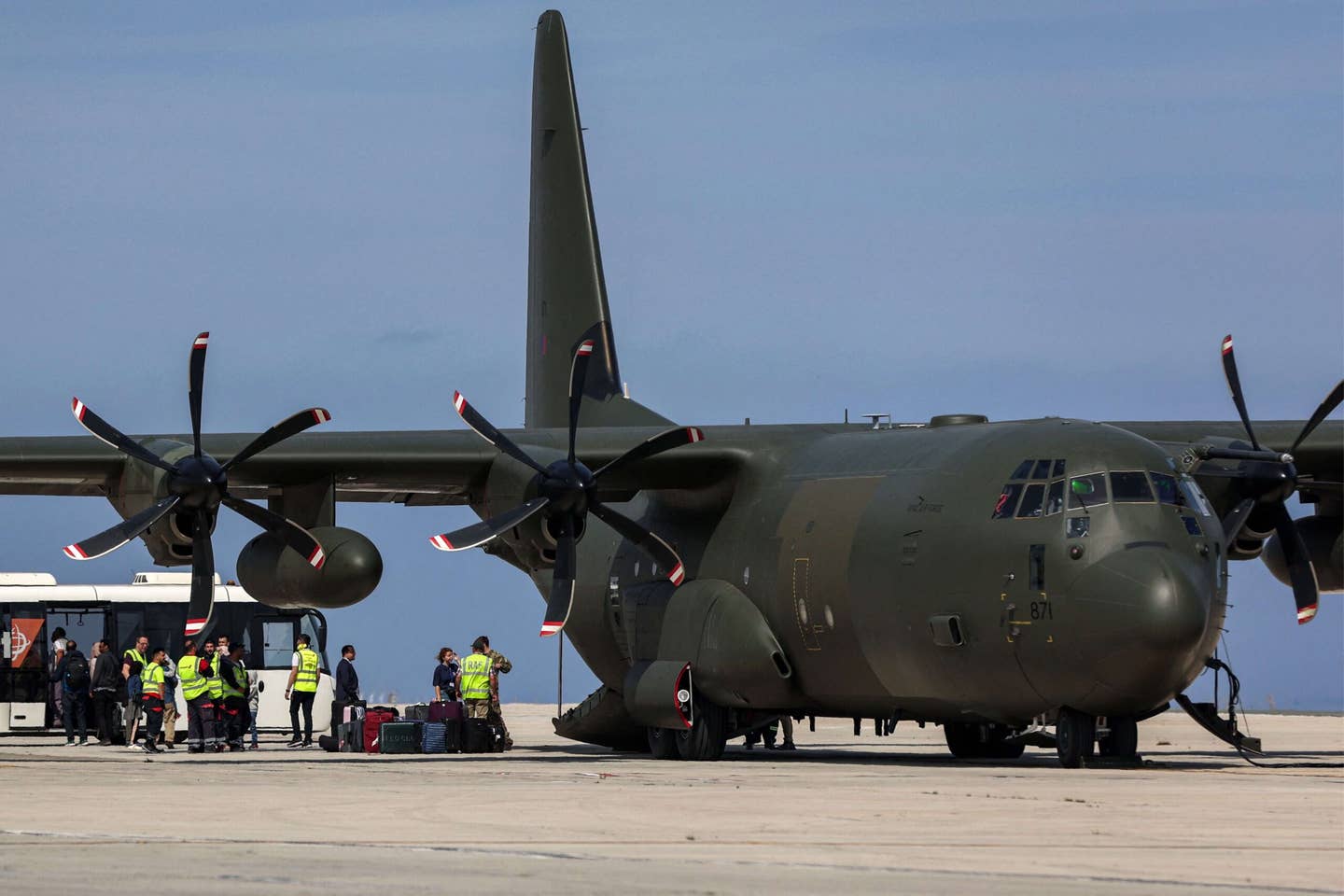 A British Royal Air Force C-130 Hercules military transport that was carrying evacuees from Sudan is pictured on the tarmac at Larnaca International Airport in Cyprus on April 26, 2023. <em>Photo by CHRISTINA ASSI/AFP via Getty Images</em>