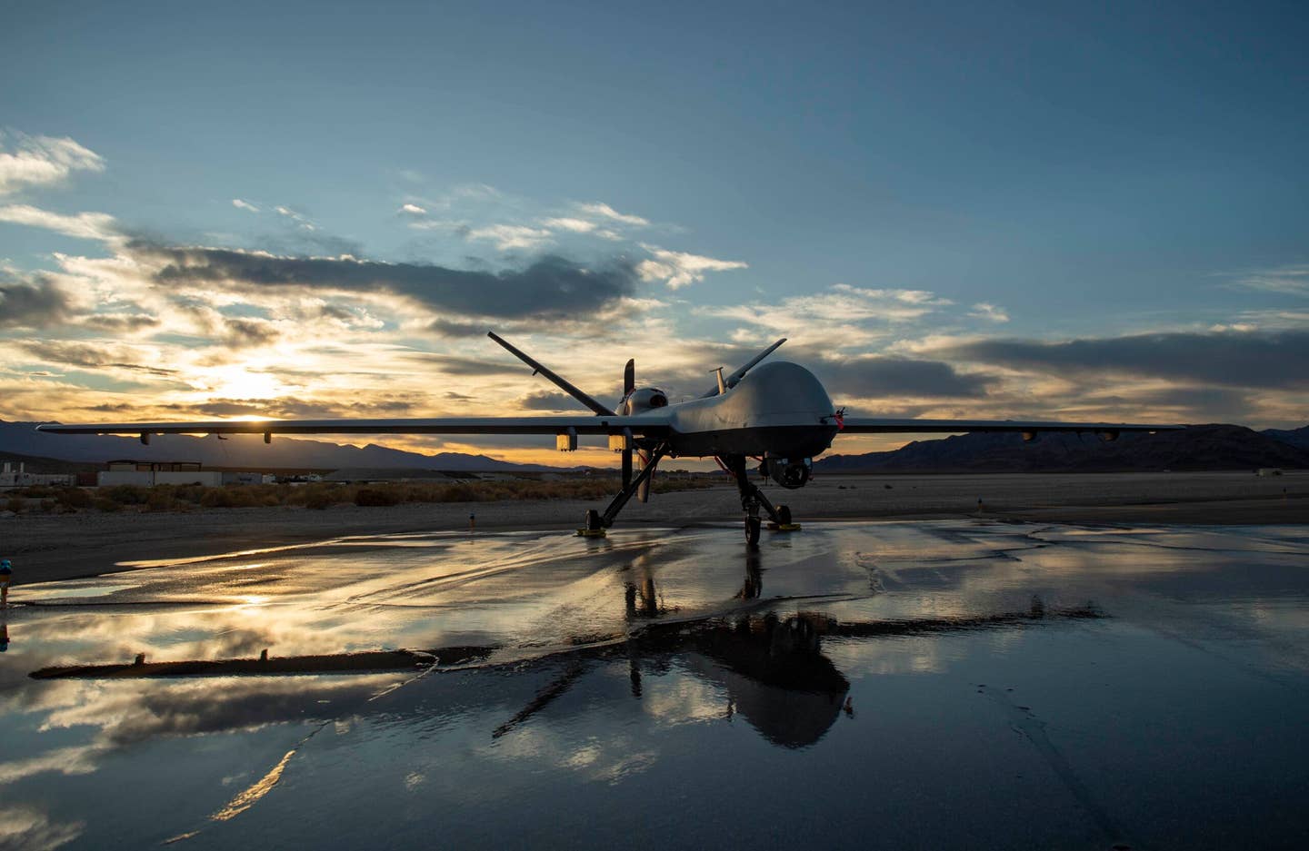 An MQ-9 Reaper sits on the runway during sunset at Creech Air Force Base, Nev., Nov. 17, 2020. <em>U.S. Air Force photo by Staff Sgt. Lauren Silverthorne</em>