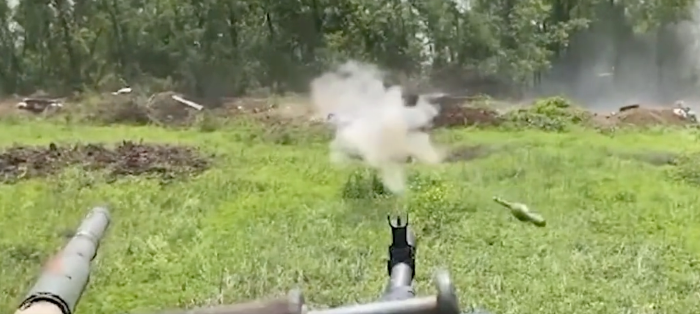 The first of two RPGs fired at a Ukrainian tank narrowly missed. (Twitter screencap)
