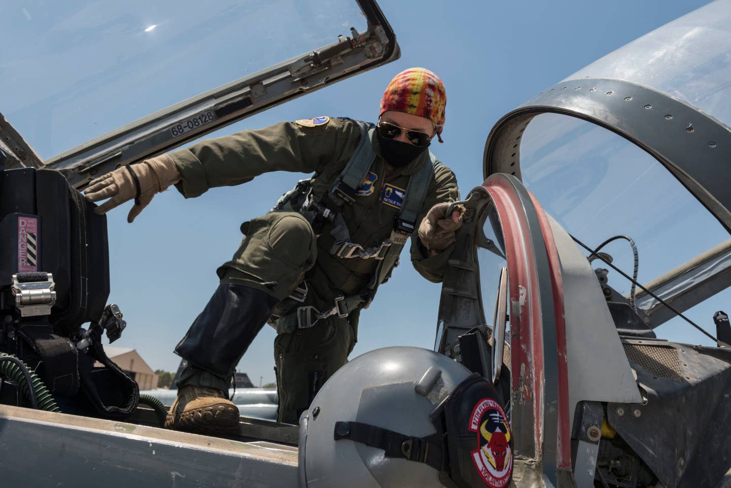Capt. Natalie Rambish, 47th Operations Support Squadron aircrew and flight equipment commander and instructor pilot, climbs into her seat in a T-38C Talon as she prepares to fly with a student pilot at Laughlin Air Force Base, Texas. <em>U.S. Air Force photo by Senior Airman Anne McCready</em><br><a href="https://www.laughlin.af.mil/News/Display/Article/2317955/female-aviators-at-laughlin-bond-through-mentorship-group/undefined"></a>
