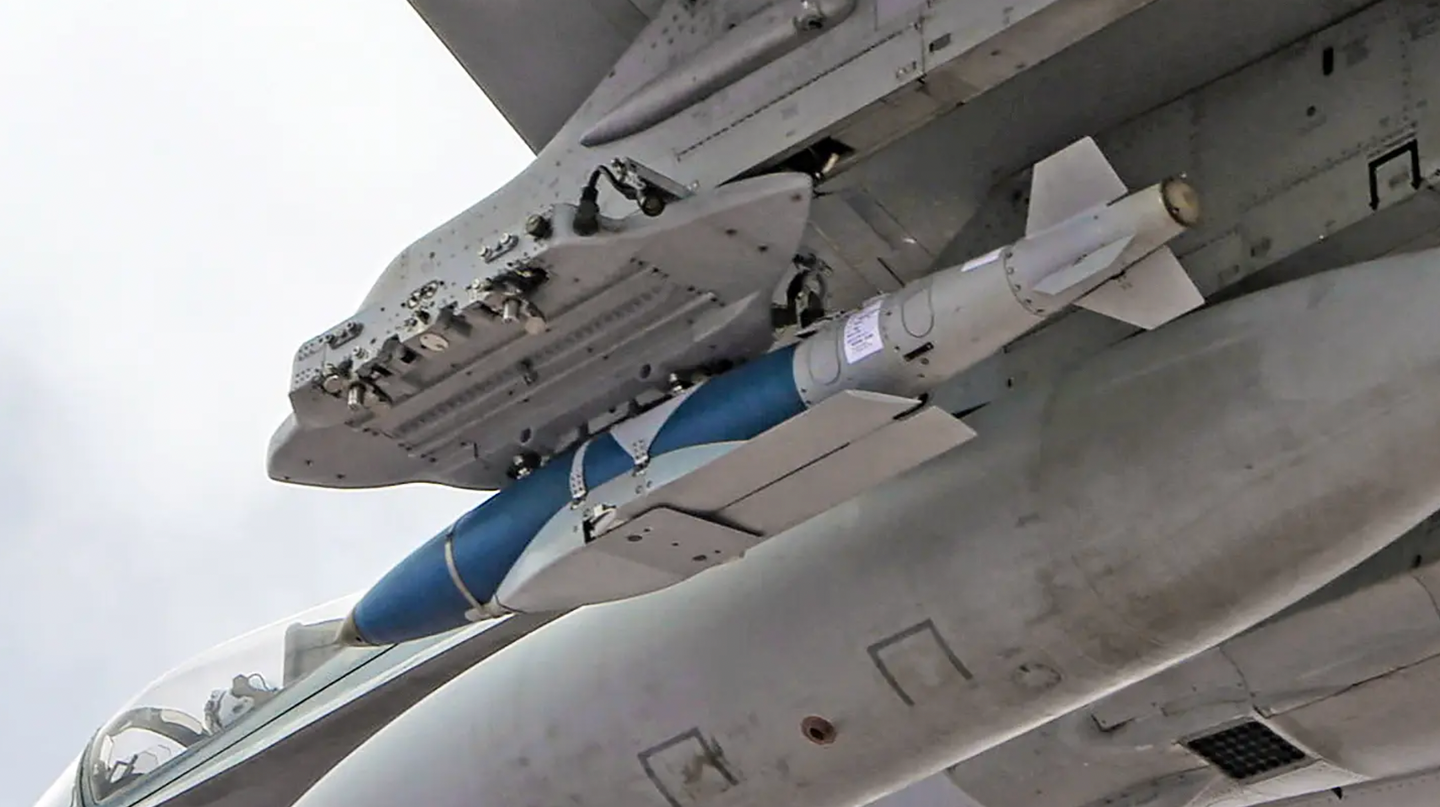A JDAM-ER carried under the wing of a Royal Australian Air Force F/A-18F Super Hornet. <em>Australian Defense Force</em>