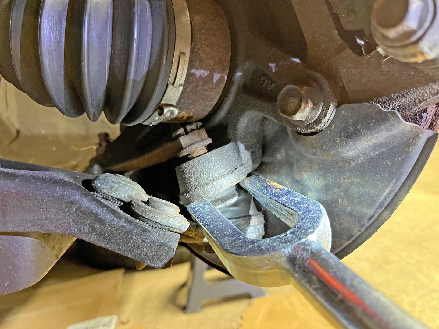 The ball joint fork will destroy the boot on a ball joint; this is only a viable removal method if the outgoing ball joint is dead. <em>Andrew P. Collins</em>