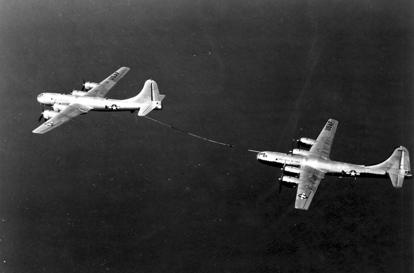 A probe-and-drogue KB-29M tanker refuels a B-29 specially modified with a nose probe. <em>U.S. Air Force</em>