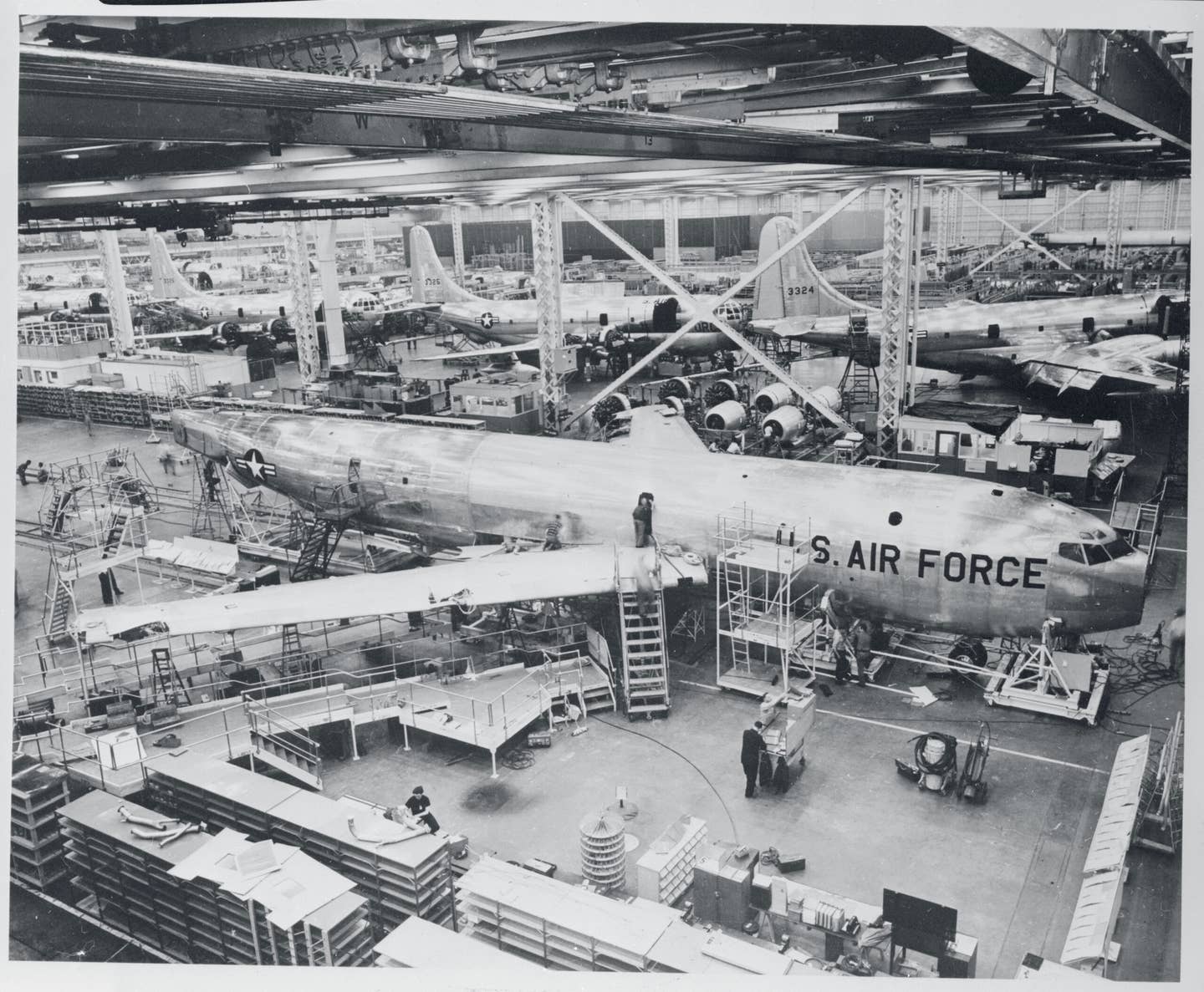 A KC-135 for Strategic Air Command takes shape at the Boeing plant in Renton, Washington, near Seattle. Note the parallel line of KC-97 piston-engine tanker transports in the background. <em>Getty Images</em>