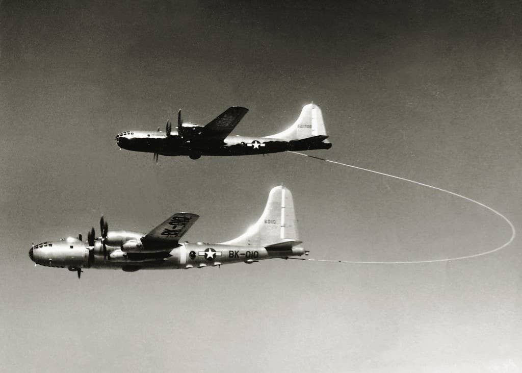 Using the looped-house system, the B-50A <em>Lucky Lady II</em> is refueled by a KB-29M in 1949. <em>Lucky Lady II</em> became the first aircraft to complete a non-stop round-the-world flight. <em>U.S. Air Force</em>