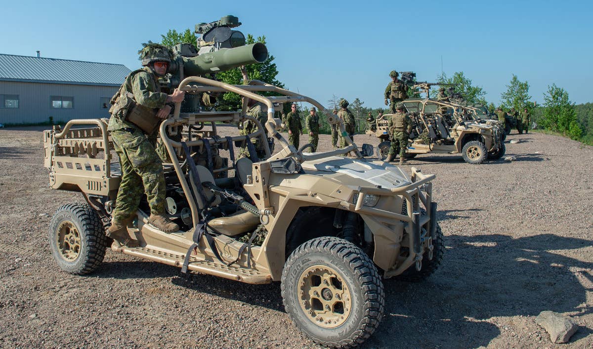 MRZRs armed with a TOW missile launcher, in front, and a .50 caliber M2 machine gun, in he background, seen during Exercise Lethal Weapon. <em>Canadian Armed Forces</em>