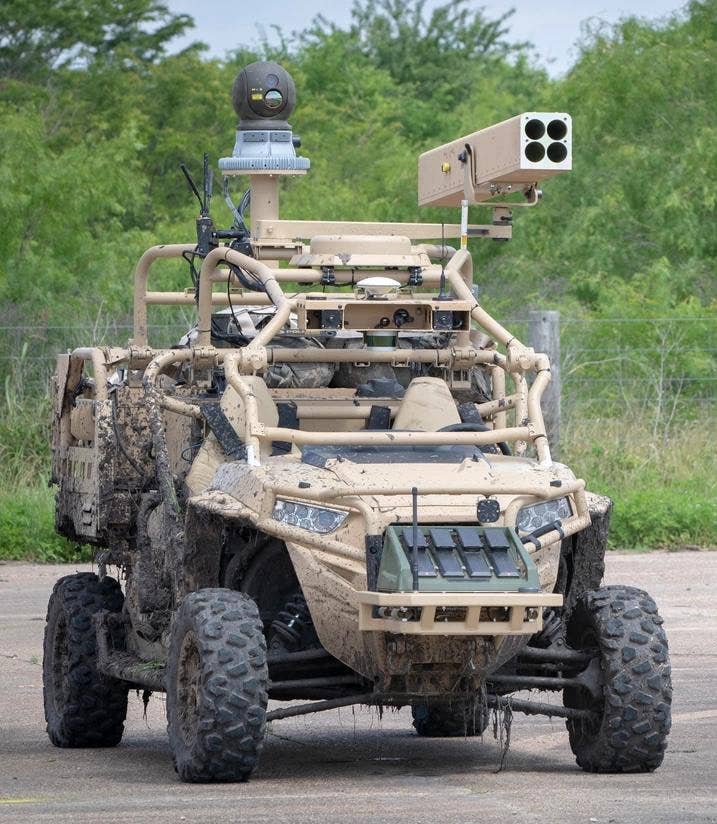 An MRZR with a four-round rocket launcher for 70mm laser-guided rockets, a sensor turret, and a launch system for Balck Hornet microdrones. <em>US Army</em>