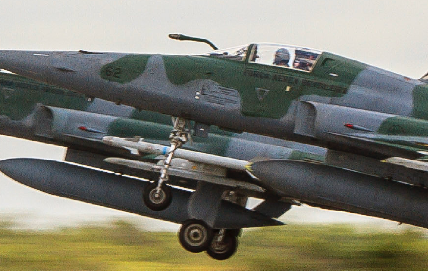 A Brazilian F-5 pair takes off, with a Python 4/AIM-9P-lookalike training round on the furthest aircraft. <em>Brazilian Air Force</em>