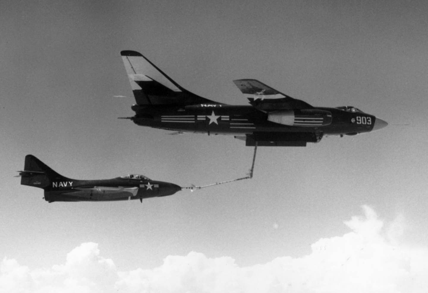 In a different experiment, a probe-equipped U.S. Navy F9F-7&nbsp;Cougar&nbsp;refuels from an adapted A3D-2&nbsp;Skywarrior in the mid-1950s. <em>U.S. Navy</em><br>