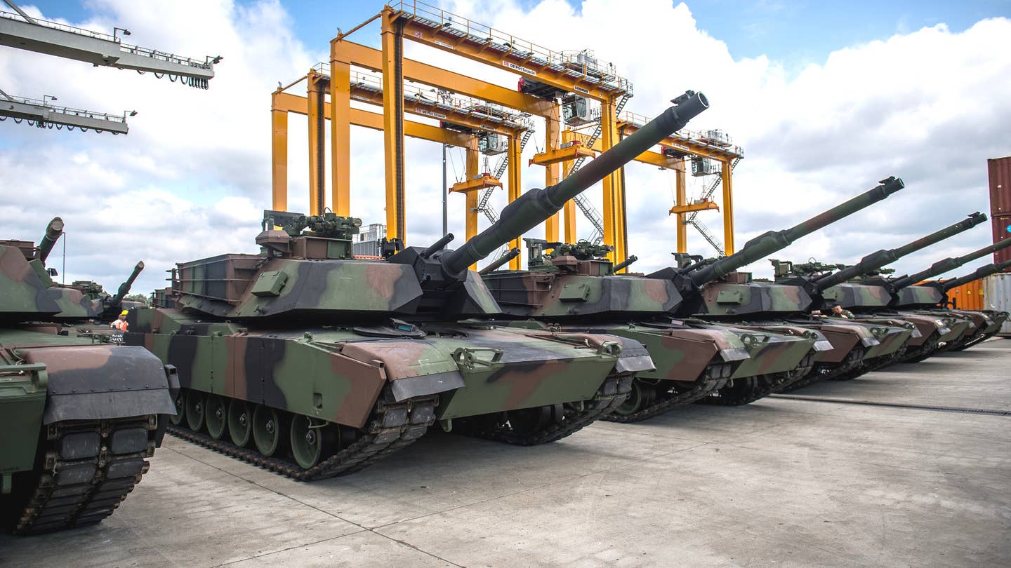 Some of Poland's first M1 Abrams tanks at the port of Szczecin after their arrival this week. <em>Polish Ministry of Defense</em>