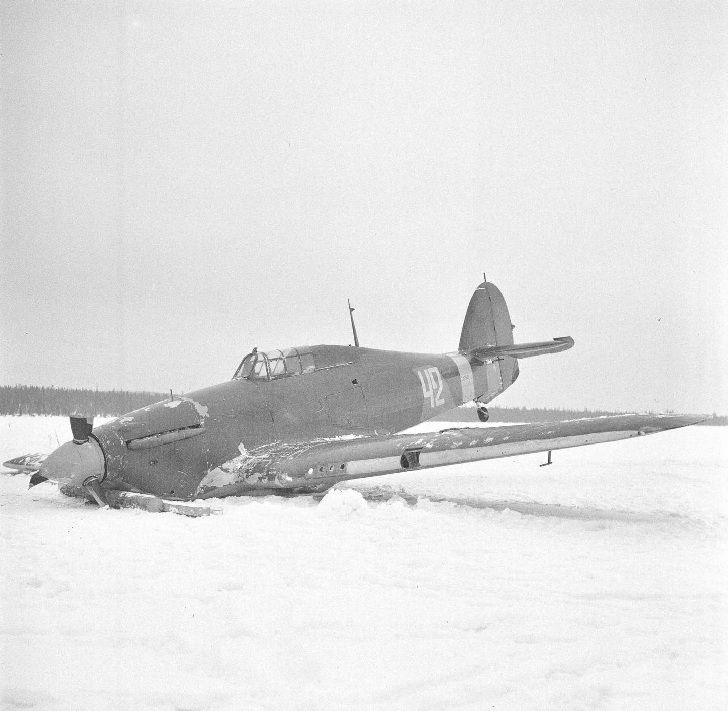 A Soviet Hurricane that was shot down during action against Finnish forces in March 1942. Both Finland and the Soviet Union operated Hurricanes in World War II. <em>SA-kuva/Wikimedia Commons</em>