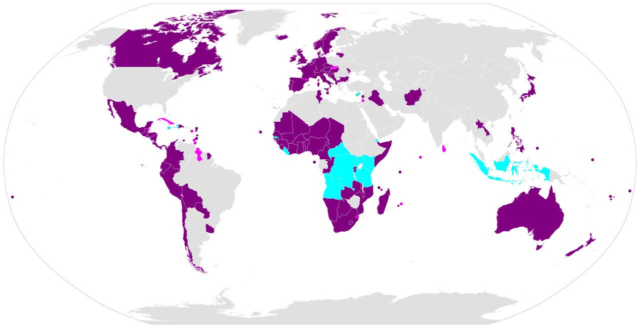 A map showing countries where the Convention on Cluster Munitions has entered force (in purple), as well as those who have signed, but not ratified (in blue) or acceded to (in pink) the agreement. Note that most of Europe is purple. <em>AndrewRT via Wikimedia</em>