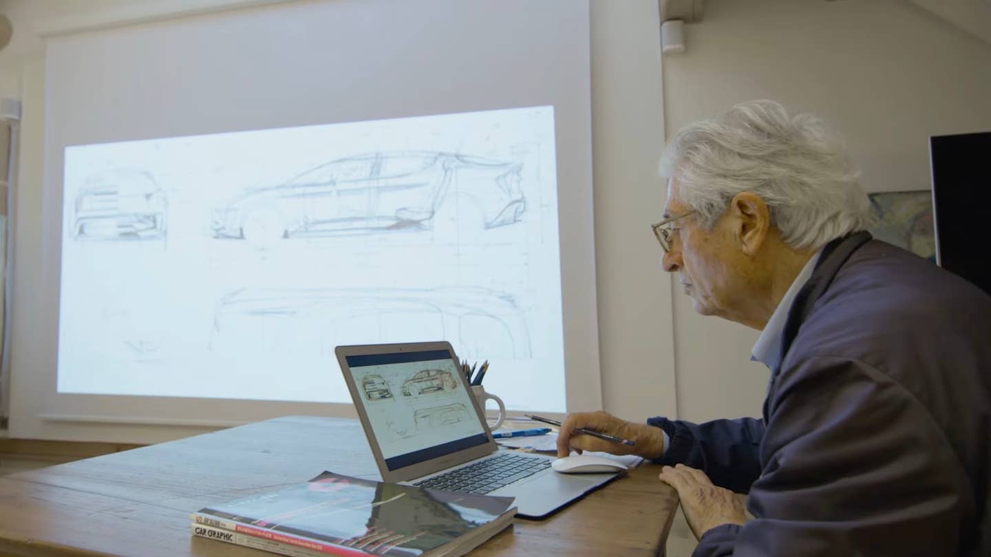 Giorgetto Giugiaro works on a laptop