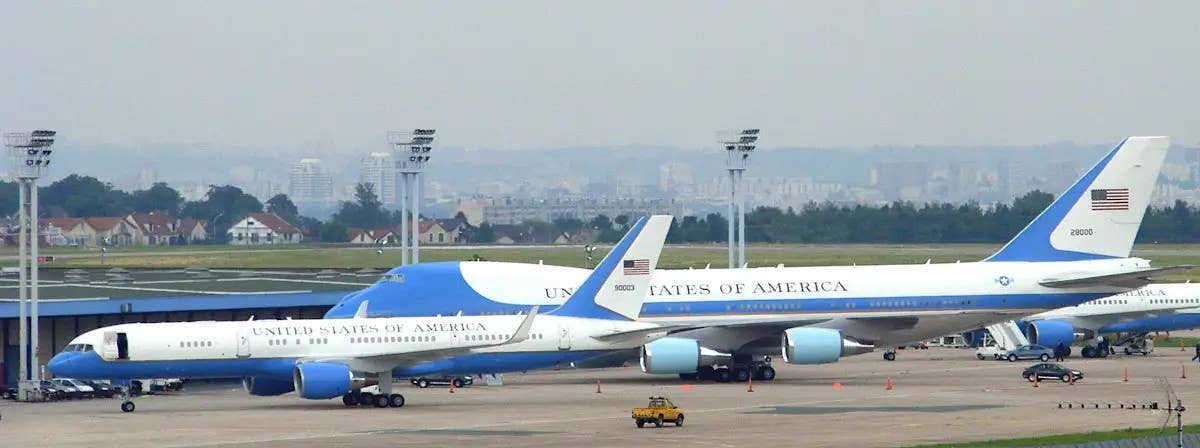 A C-32A aircraft, in front, together with a VC-25A Air Force One jet at Paris Orly Airport in France in 2009.&nbsp;<em>Mathieu Marquer via Wikimedia</em>