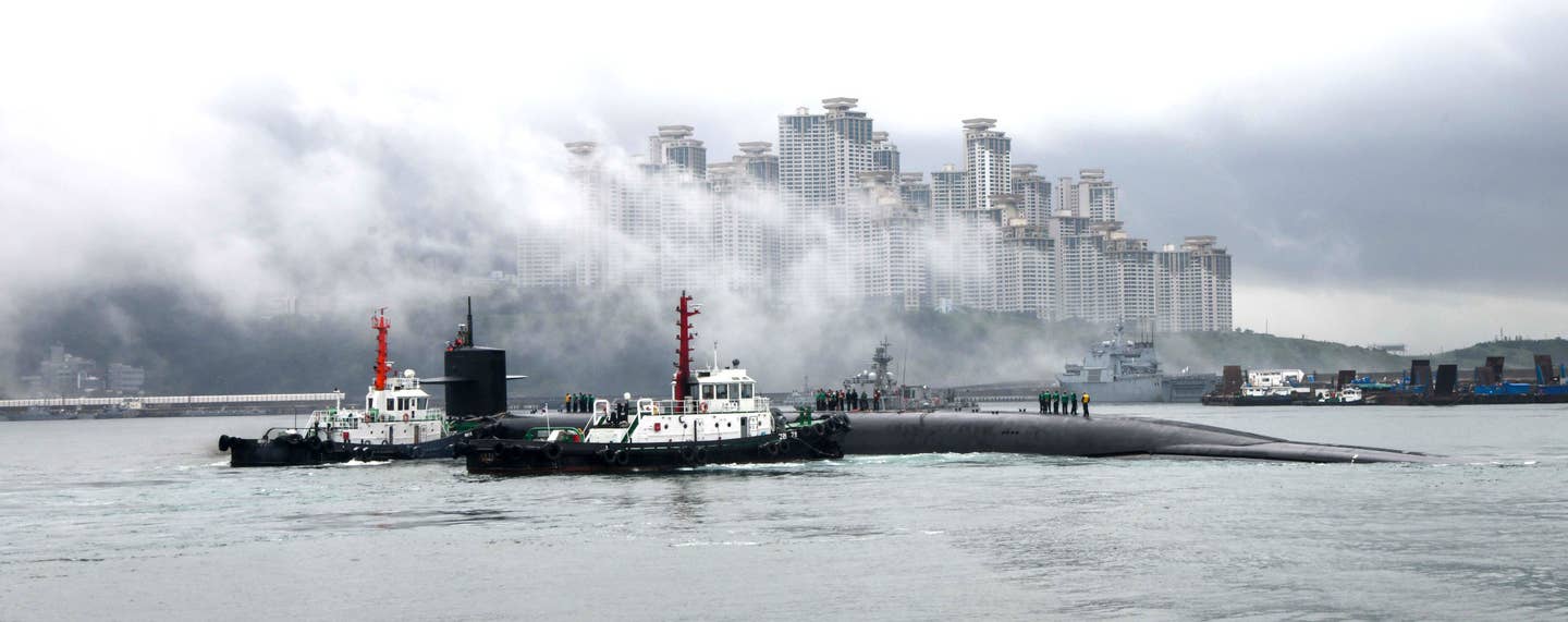 The <em>Ohio</em> class nuclear ballistic missile submarine USS <em>Kentucky</em> arriving in South Korea's port of Busan on July 18, 2023. <em>USN</em>