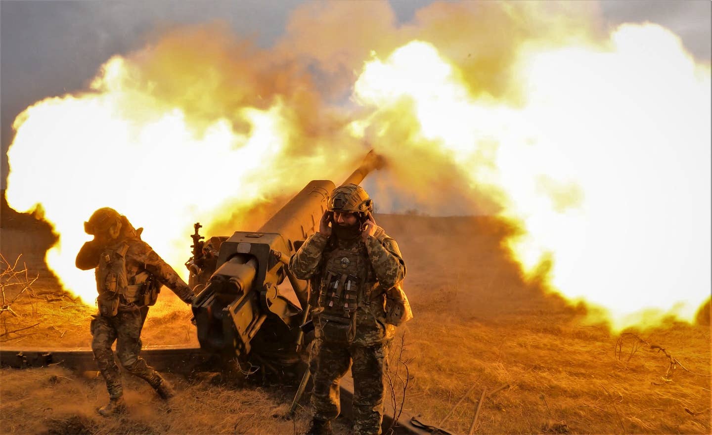Ukrainian troops firing a D-30 howitzer. (Photo by SERGEY SHESTAK/AFP via Getty Images)