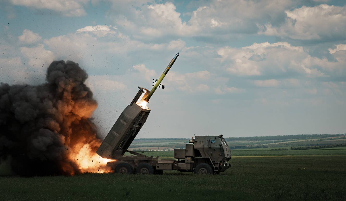 A M142 HIMARS launches a Guided Multiple Launch Rocket System (GMLRS) munition toward a Russian position in Bakhmut. (Photo by Serhii Mykhalchuk/Global Images Ukraine via Getty Images)