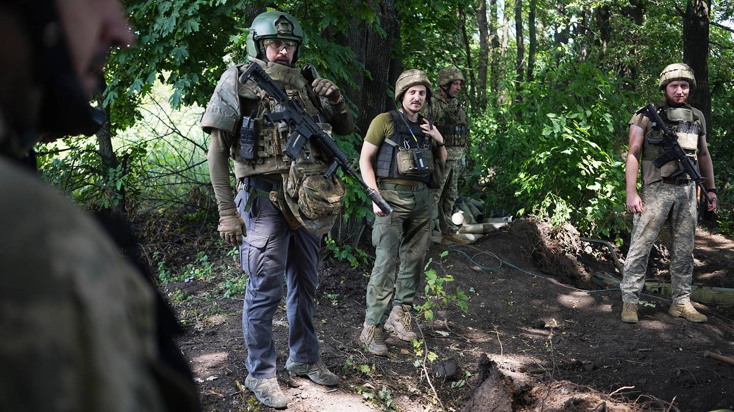 LYMAN, UKRAINE - JULY 18: Ukrainian soldiers of the Bohun brigade are on duty one kilometre from Russian lines in Lyman, Ukraine, on July 18, 2023. The Ukrainian military reported on July 17 that the Russian forces had deployed more than 100,000 personnel in the Lyman-Kupyansk area. A Ukrainian Senior Officer stated that Russiaâs deployment of 100,000 troops in Lyman-Kupyansk is not a threat. (Photo by Jose Colon/Anadolu Agency via Getty Images)