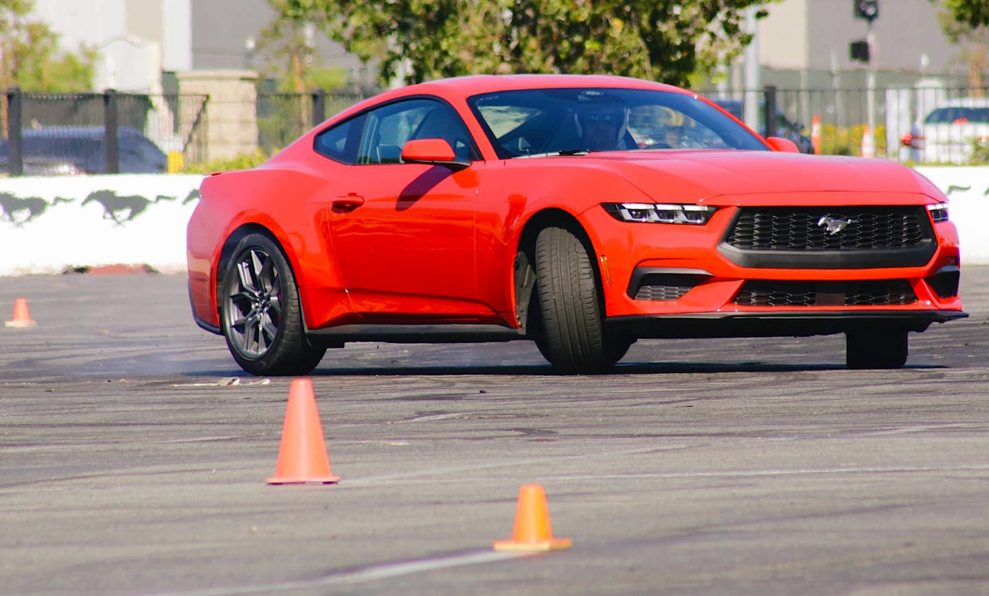 The 2024 Ford Mustang EcoBoost drifting.