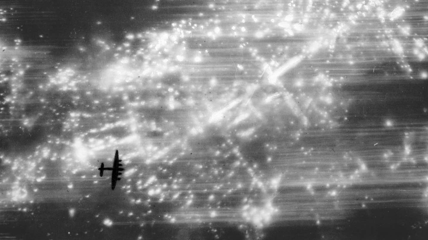 Lancaster bomber over the German city of Hamburg