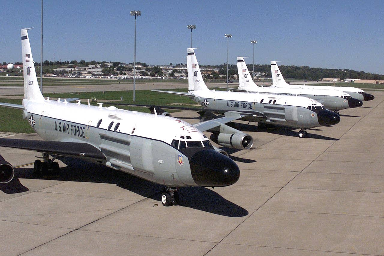 Two of the Air Force's three RC-135S Cobra Ball aircraft, in front, along with two RC-135V/W Rivet Joints. <em>USAF</em>