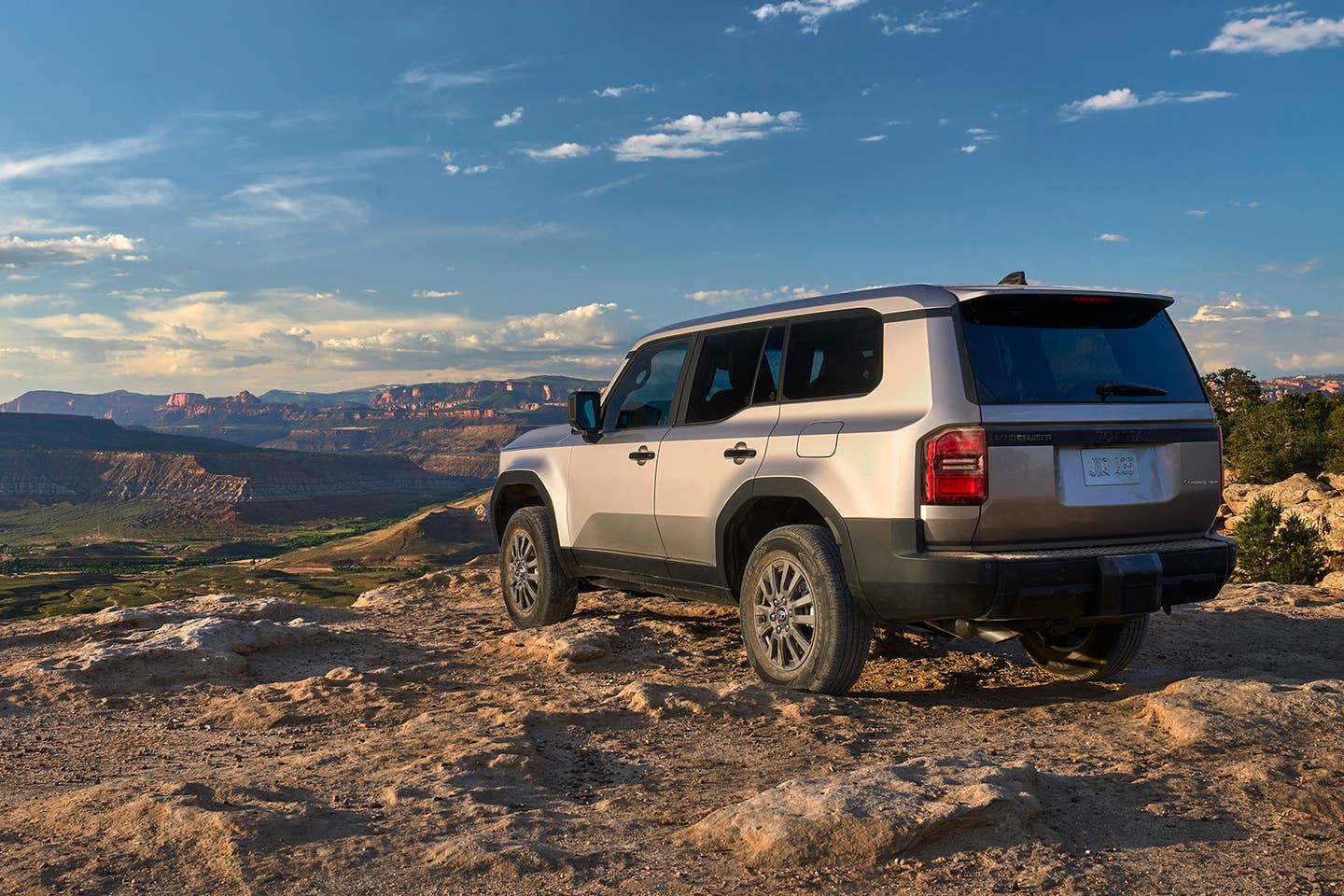 2024 Toyota Land Cruiser overlooks a desert scene
