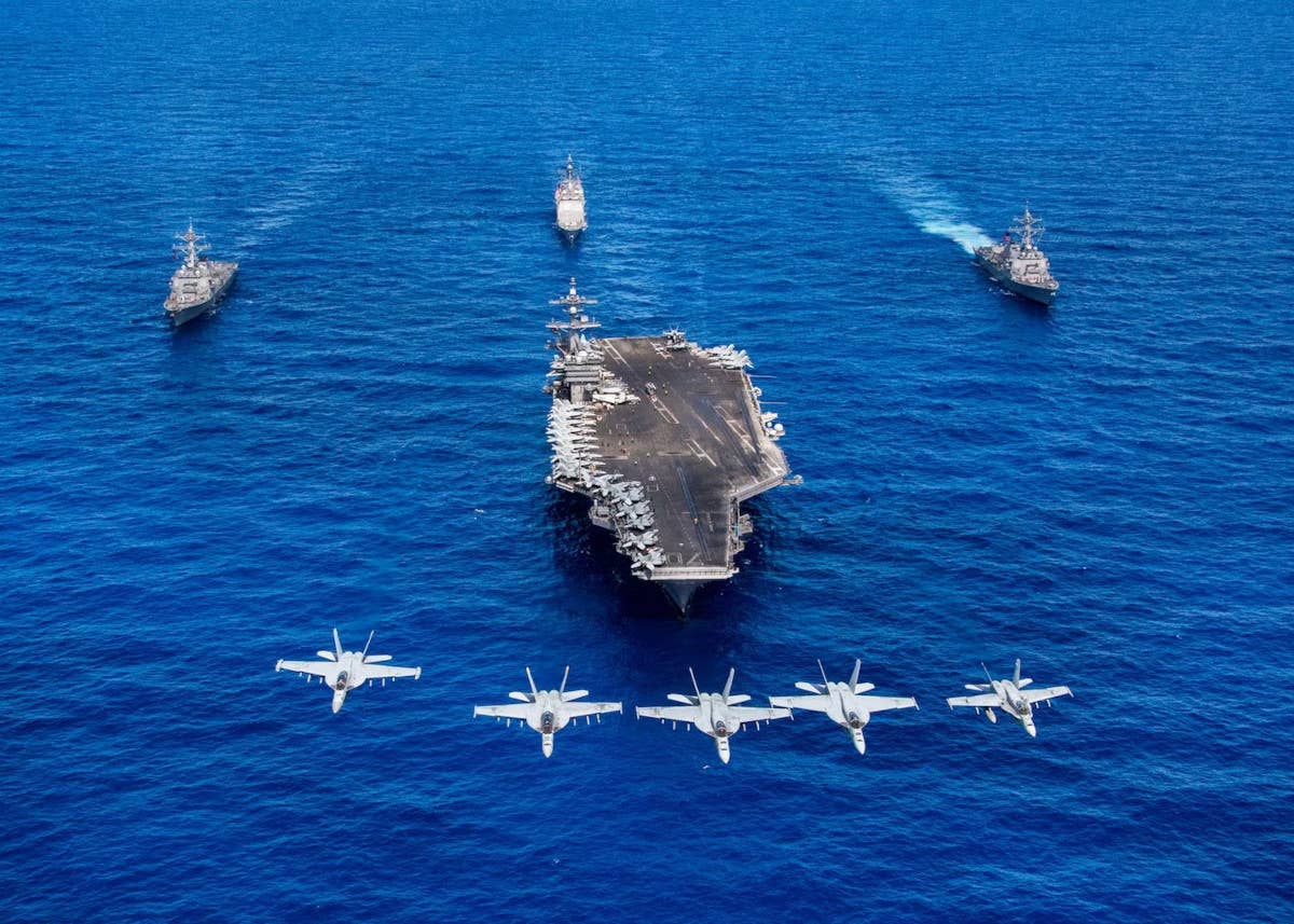 The USS Carl Vinson and elements of its strike group during a deployment in 2018. <em>USN</em>