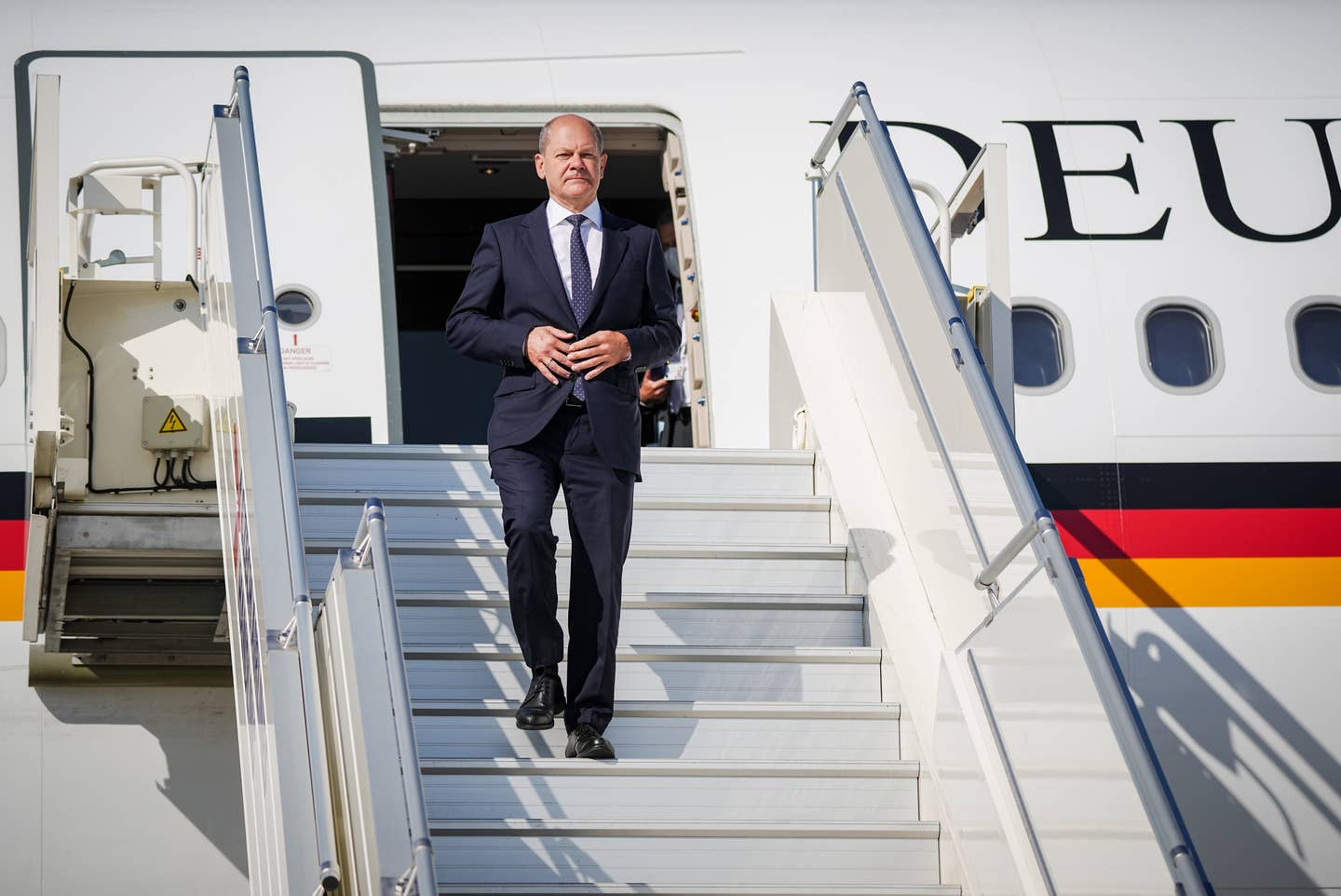 German Chancellor Olaf Scholz disembarks a Luftwaffe A340 after landing in Prague, Czech Republic, on August 29, 2022. <em>Photo by Kay Nietfeld/picture alliance via Getty Images</em>