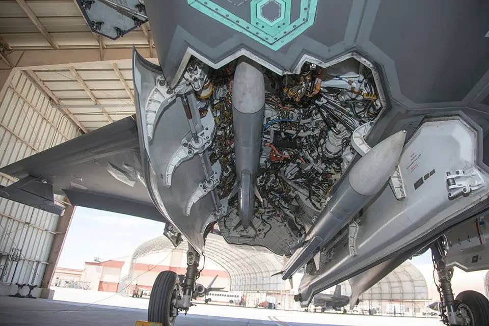 A stock shot of two AIM-120 AMRAAMs in one of the F-35B's two bays. The aircraft seen here belongs to the Royal Air Force in the United Kingdom. <em>Crown Copyright</em>