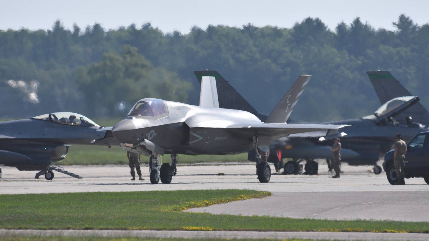 A Marine Corps F-35B from VMFA-211 at Volk Field Air National Guard Base taking part in Northern Lightning 2023. F-16s participating in the exercise are seen in the background. <em>Andy Laurent</em>
