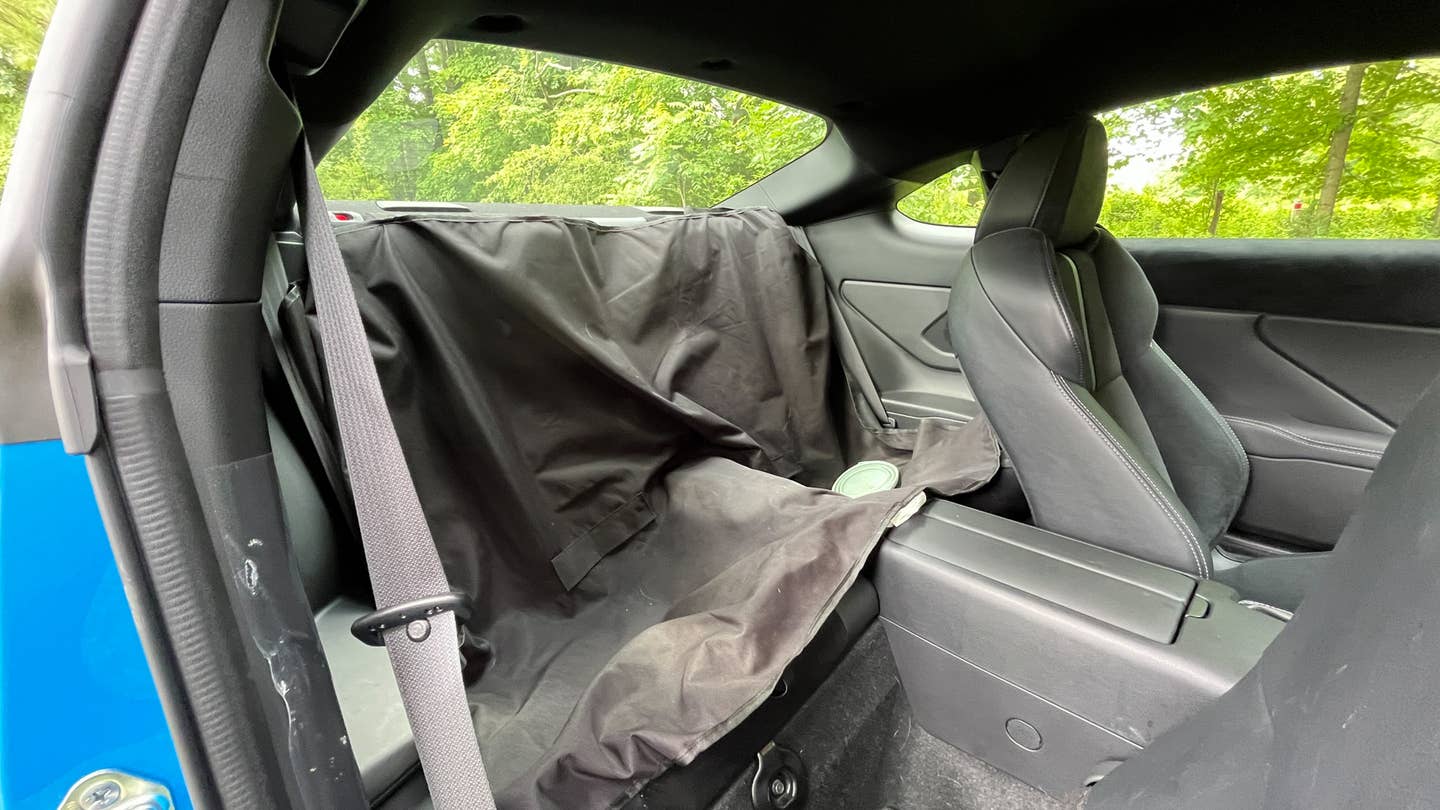 I like having a simple seat cover to throw into cars. This Dickie’s Repreve happened to be the cheapest one I could grab <a href="https://www.walmart.com/ip/Genuine-Dickies-1-Piece-Repreve-Rear-Seat-Cover-and-Protector-Black-43164WDI/407629582?wmlspartner=wlpa&amp;selectedSellerId=0&amp;wl13=2637&amp;adid=22222222277407629582_117755028669_12420145346&amp;wmlspartner=wmtlabs&amp;wl0=&amp;wl1=g&amp;wl2=c&amp;wl3=501107745824&amp;wl4=pla-294505072980&amp;wl5=9004749&amp;wl6=&amp;wl7=&amp;wl8=&amp;wl9=pla&amp;wl10=8175035&amp;wl11=local&amp;wl12=407629582&amp;wl13=2637&amp;veh=sem_LIA&amp;gclsrc=ds" target="_blank" rel="noreferrer noopener nofollow">at Walmart</a>. <em>Andrew P. Collins</em>