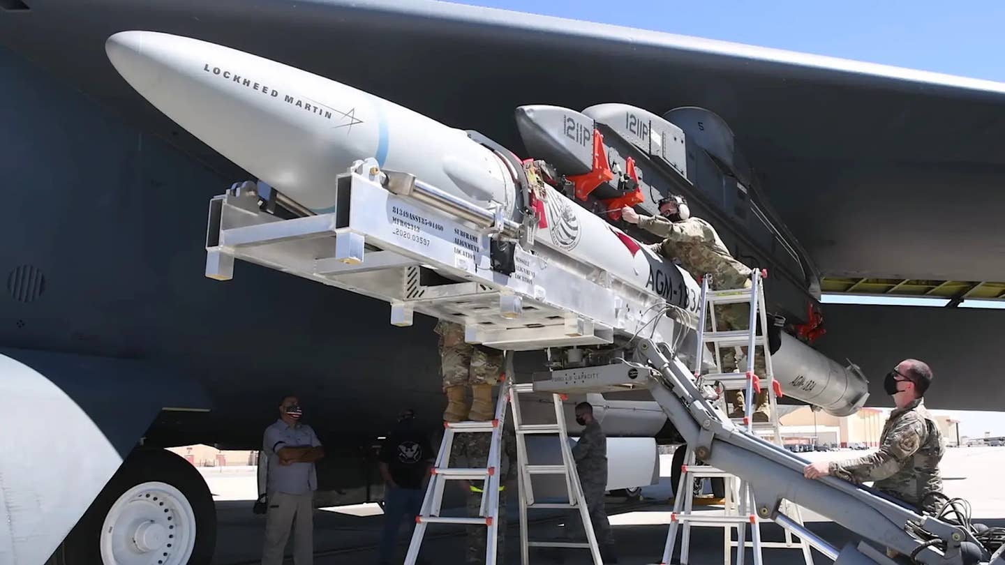 AGM-183 Air-launched Rapid Response Weapon (ARRW) test articles are loaded on a B-52H bomber during a previous test. <em>USAF</em>