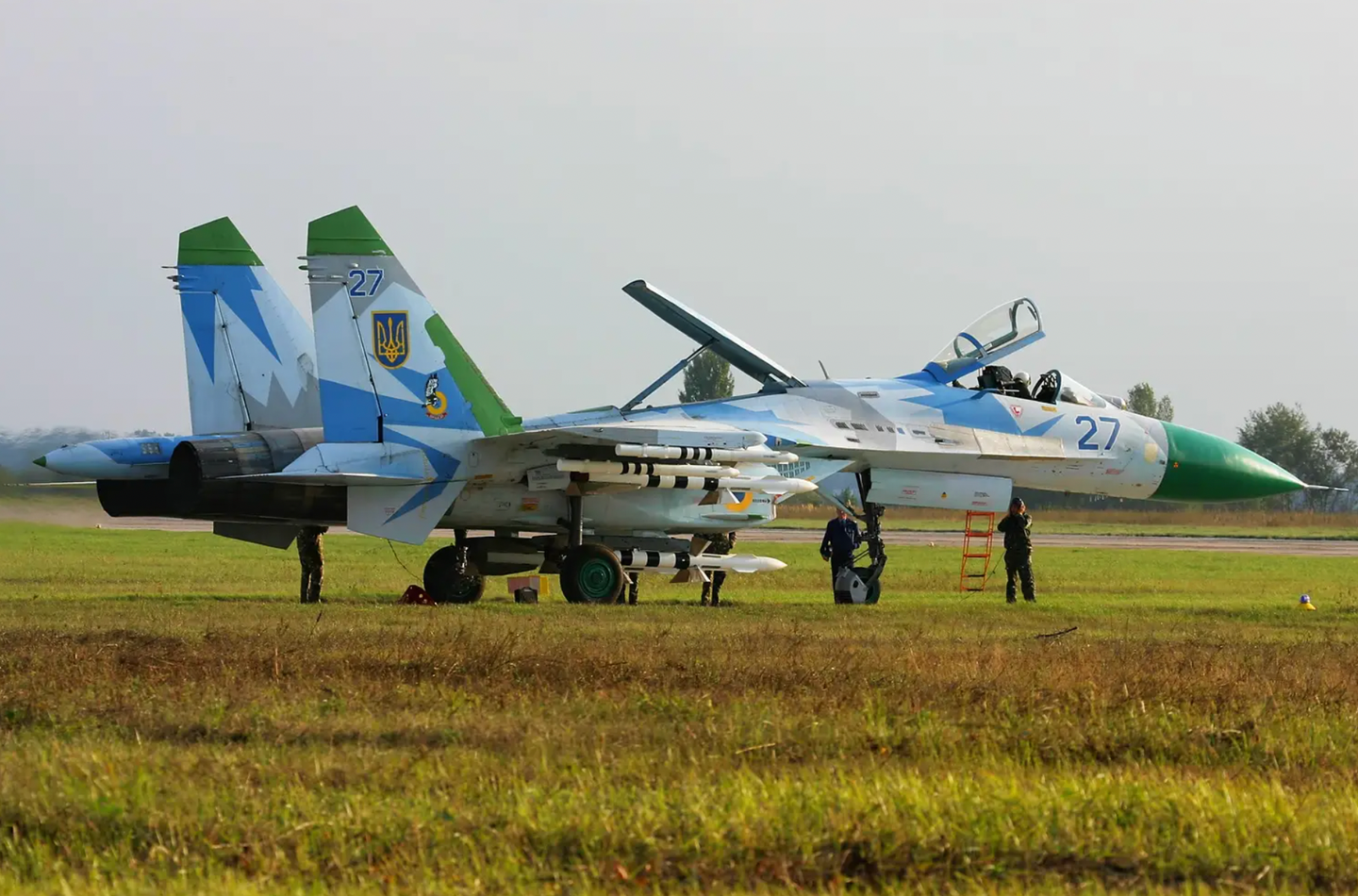A Ukrainian Air Force Su-27 with a green radome and tailfin caps at Kyiv-Gostomel Airport in September 2008.&nbsp;<em>Oleg V. Belyakov/Wikimedia Commons</em>