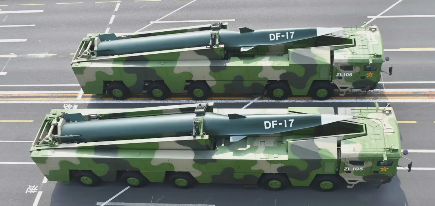 Two mockups of the Chinese DF-17 short-range ballistic missile, which carries a hypersonic boost-glide vehicle warhead.&nbsp;<em>China Military</em>