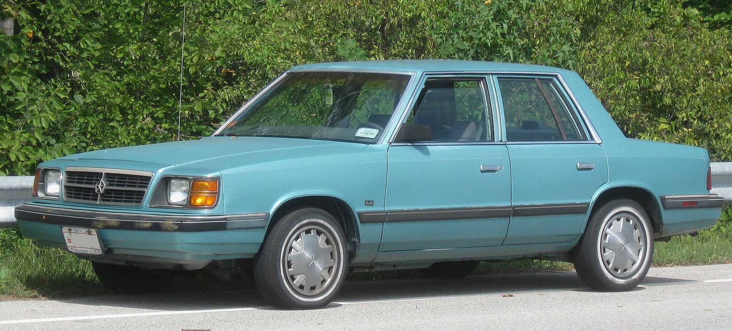 A 1985 Dodge Aries; note the grille design.