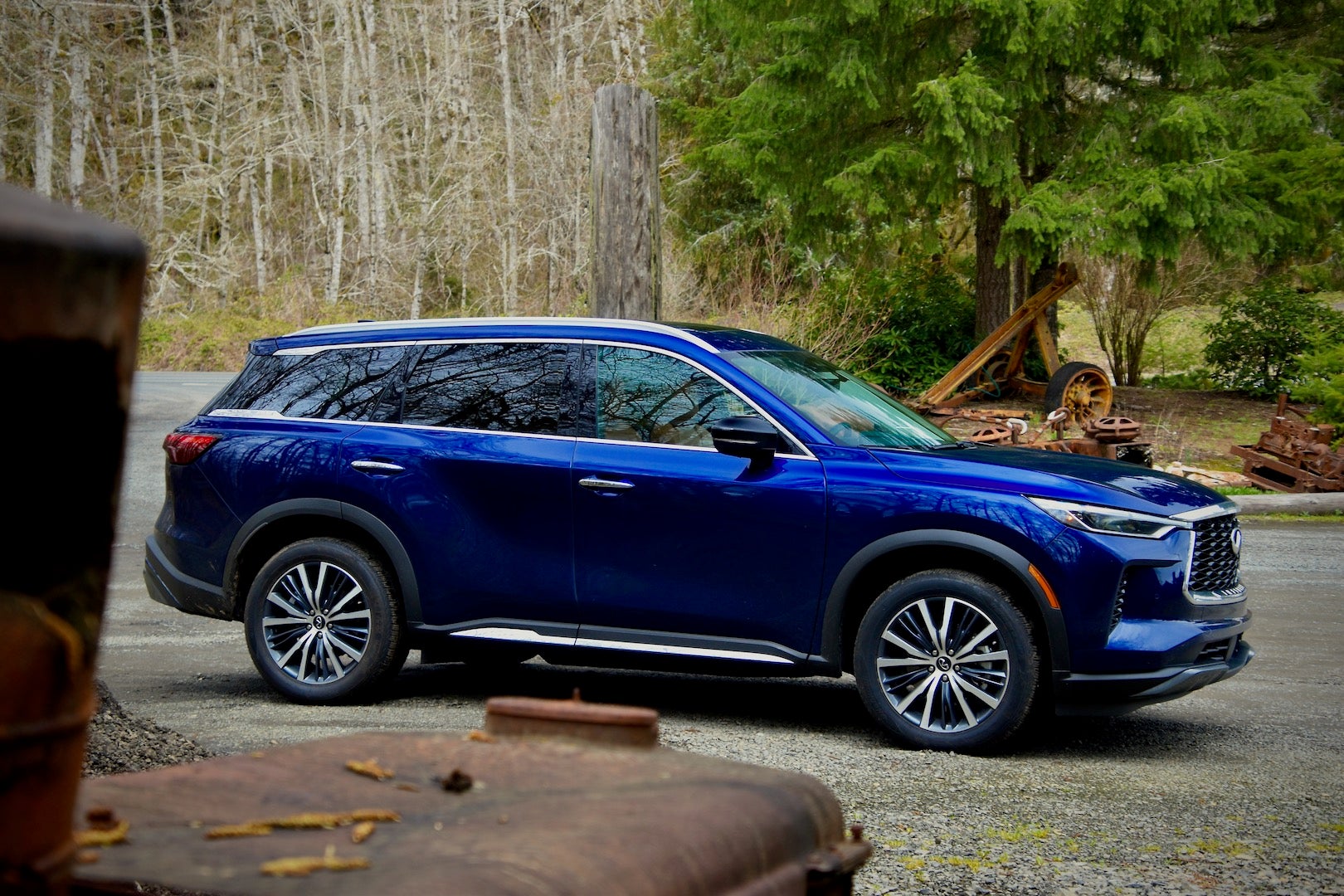 2023 Infiniti QX60 Sensory AWD side in the Oregon forest