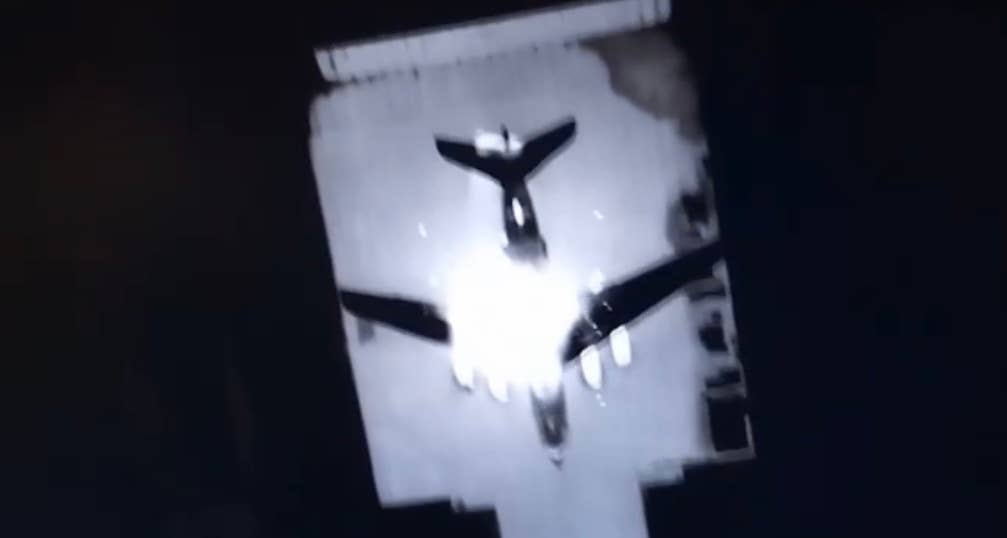 An image of an Il-76 being attacked by a Ukrainian drone at the Kresty Air Base in Pskov, Russia. (GUR image)