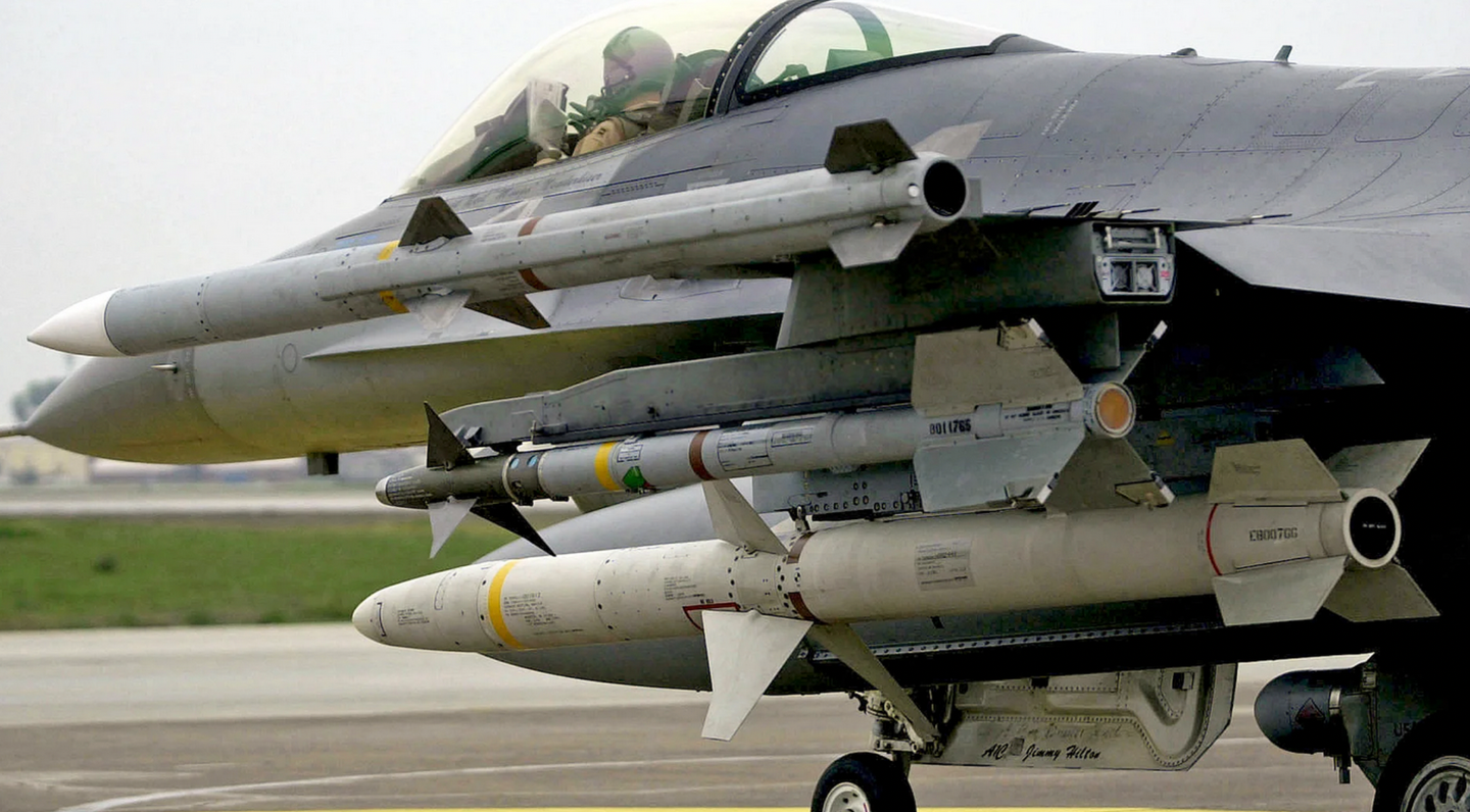 A U.S. Air Force F-16C fighter carries an AIM-120C AMRAAM on the wingtip, with an AIM-9L/M Sidewinder on the outermost underwing pylon, and an AGM-88 HARM on the mid-wing pylon. <em>U.S. Air Force</em>