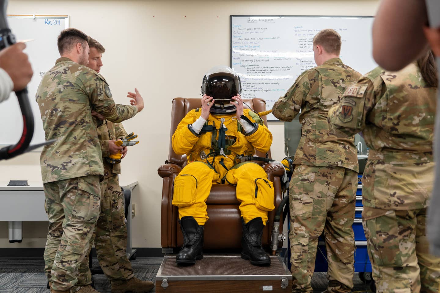 Blair experiencing his fitted pressure suit prior to the actual mission. (Blair Bunting)